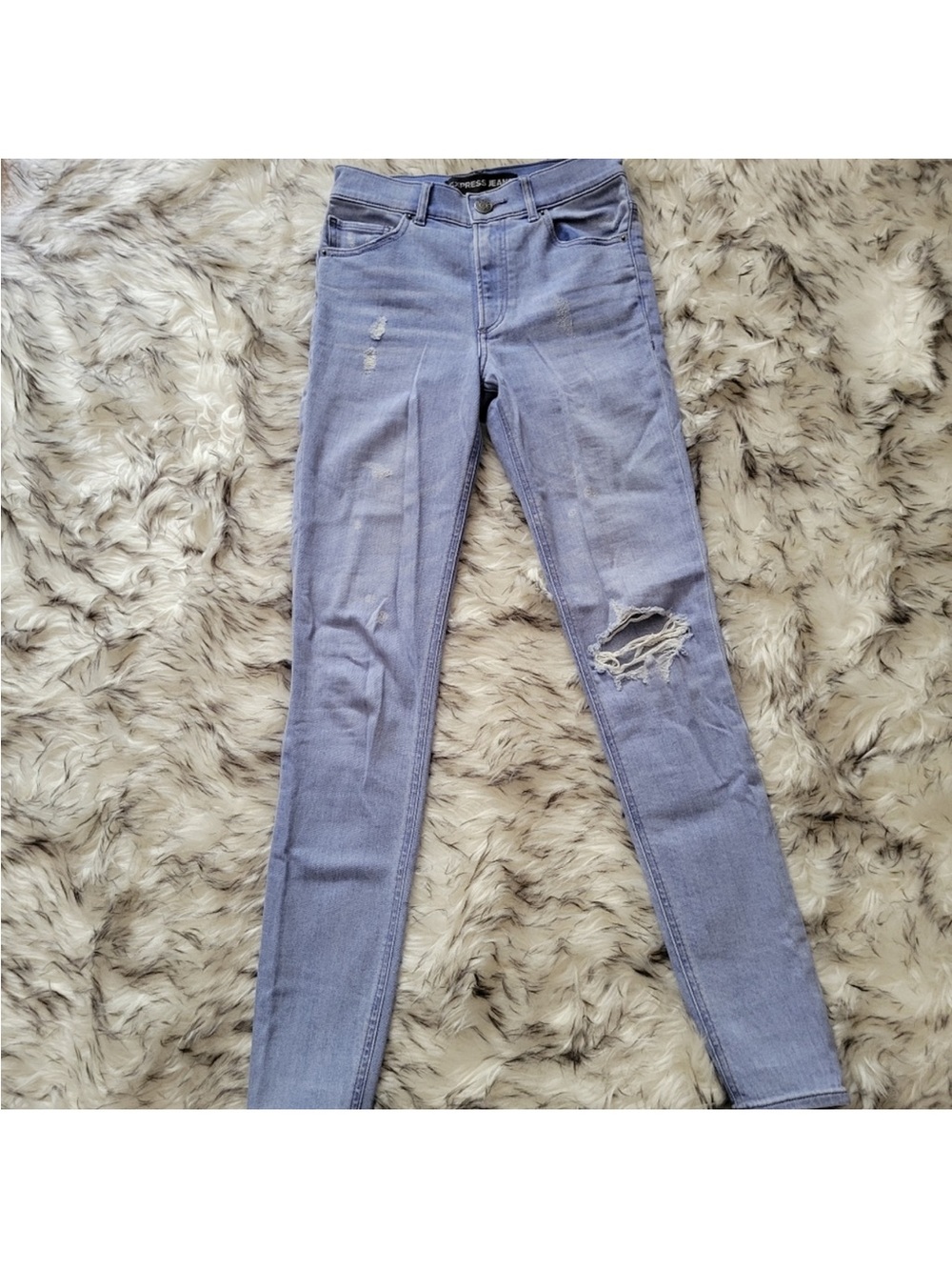 Express Light Blue Skinny Jeans with Knee Distress